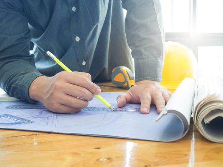 Architect concept, Architects working with blueprints in the officeの写真素材