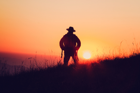 Silhouette Of People having fun at sunset timeの写真素材