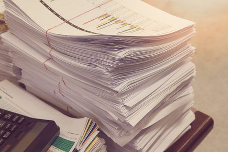 Business Concept, Pile of unfinished documents on office desk, Stack of business paper, Vintage Effectの写真素材