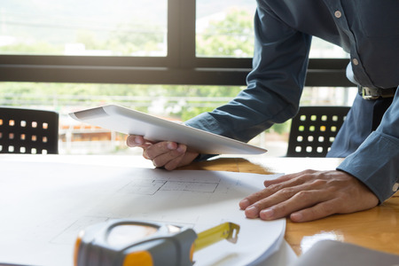 Engineer and Architect concept, Engineer Architects office team working with blueprintsの写真素材