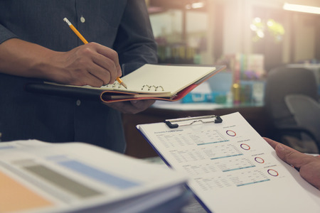Business and finance concept of office working, Businessman discussing sale analysis Chartの写真素材