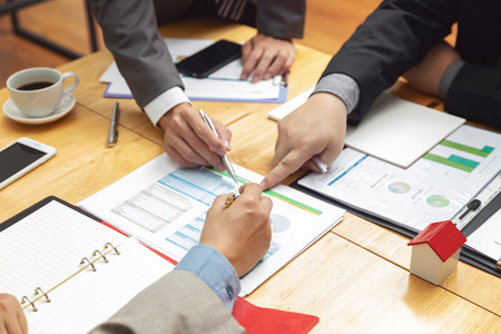 Business and finance concept of office working,Teamwork of Businessmen discussing business investment plan in officeの写真素材