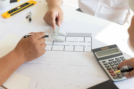 Engineer and Architect concept, Engineer Architects office team working with blueprints