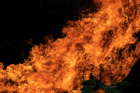 Closeup Fire flames from gas explosion on black background.の写真素材