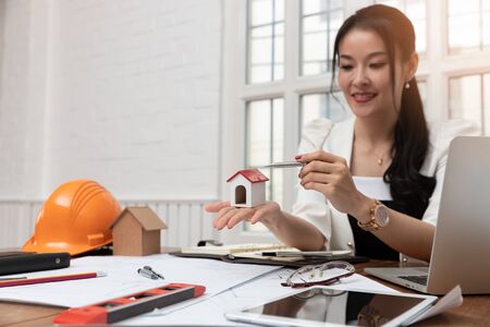 Engineer and Architect concept, Engineer Architects office team working with blueprintsの写真素材