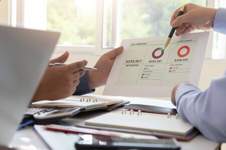 Business and finance concept of office working,Teamwork of Businessmen discussing business plan in...