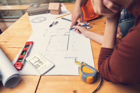 Engineer and Architect concept, Engineer Architects office team working with blueprintsの写真素材