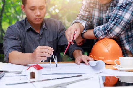Engineer and Architect concept, Engineer Architects  and Interior designer office team working with...