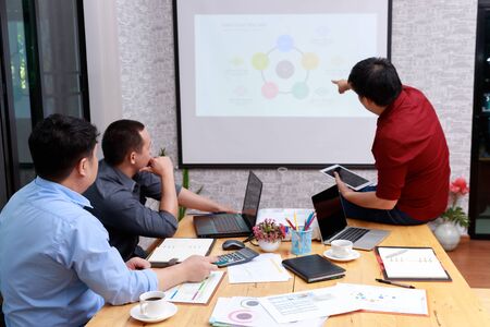Small and Medium Enterprise Business concept of ,Businessman presenting investment plan to his...