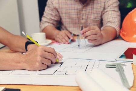 Engineer and Architect concept, Engineer Architects  and Interior designer office team working with blueprintsの写真素材
