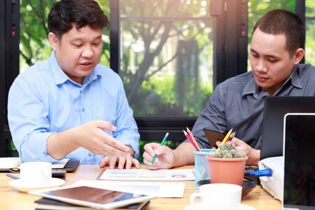 Small and Medium Enterprise Business concept of ,Businessman presenting investment plan to his partner in office.の写真素材