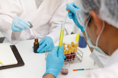 Research and development concept, Laboratory scientist researching covid-19(corona virus) vacine at lab.の写真素材