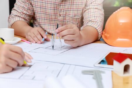 Engineer and Architect concept, Engineer Architects  and Interior designer office team working with...