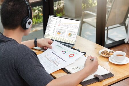 Work from home,Businessman working remotely from home. Using computer. Distance learning online education and workの写真素材