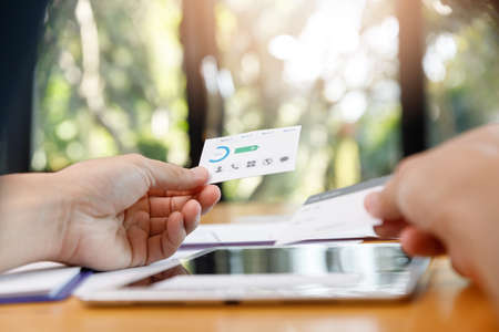 Graphic designers work together with UX UI designer planning application template layout framework for mobile phone computer mobileの写真素材