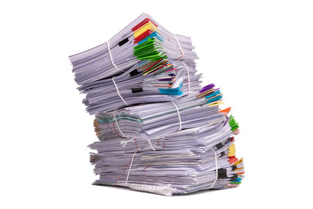 Stack of business documents papers isolated on white backgroundの写真素材