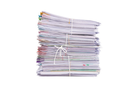 Stack of business documents papers isolated on white backgroundの写真素材
