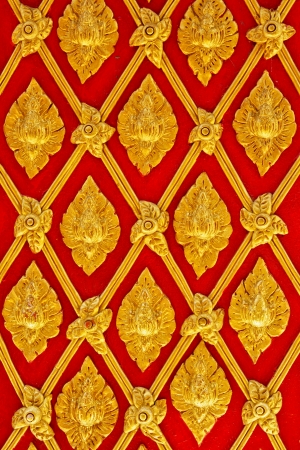 The golden Thai painting on the wall in  Thai templeの写真素材