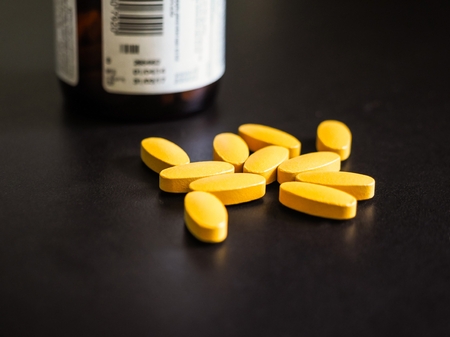 Tablets placed on a black background