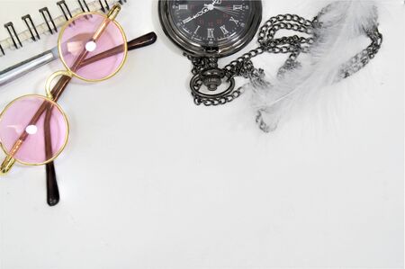 Pink fancy glasses and vintage Black Steampunk with copy space.の写真素材