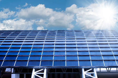 Solar panels on rooftop with sunlight.の写真素材