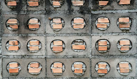 mixed brick wall with plaster.の写真素材