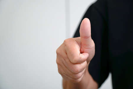 woman touching the screen with her finger,