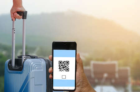 Concept of scanning a mobile QR CODE on a mobile phone.の写真素材
