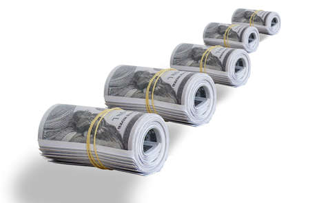dollar bundles isolated on white backgroundの写真素材