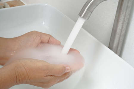 Women are washing their hands
