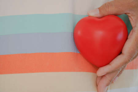 Rainbow colors. a shadow in the form of heart.