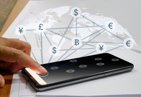 Woman using mobile phone Check money via mobile phone and internet network.の写真素材