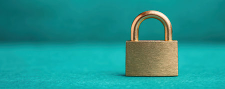 Golden padlock on a teal background, symbolizing security and protection.