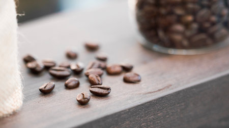 Coffee beans on a wooden background. Coffee beans on a wooden backgroundの写真素材