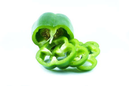 The slice green pepper isolated on white background