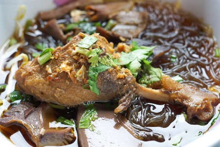 The chicken leg in noodles soup