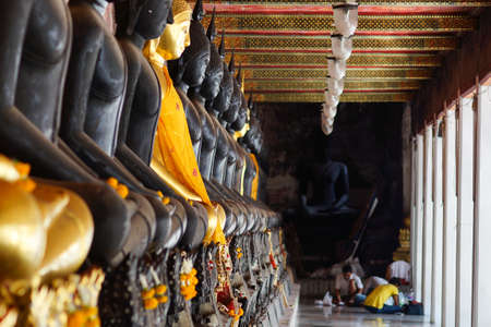 The craftsman are prepare to repair the buddha statue at the peace corner in the public templeの写真素材