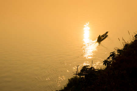 The fishermen along the river in the morning at countryside of Thailandの写真素材