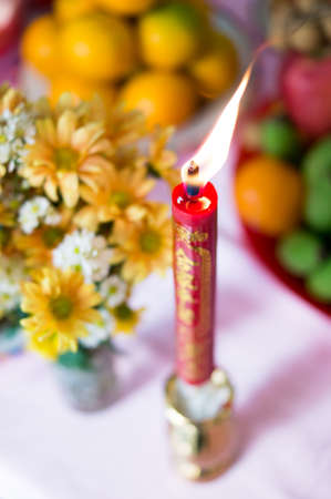 The candle light on the foods table for Chinese New Year celebrationの写真素材