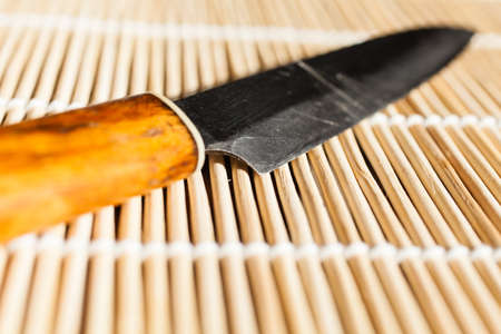 small knife on bamboo mat.の写真素材