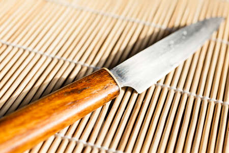 small knife on bamboo mat.の写真素材