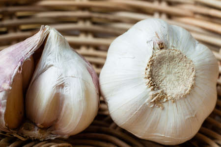old garlic in the basket.の写真素材
