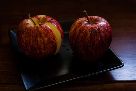 apple on retro ceramic plate.の写真素材