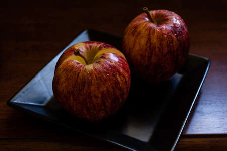 apple on retro ceramic plate.の写真素材