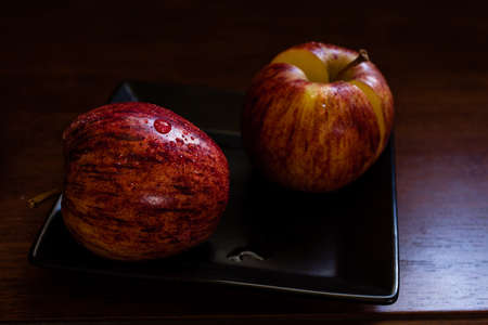 apple on retro ceramic plate.の写真素材