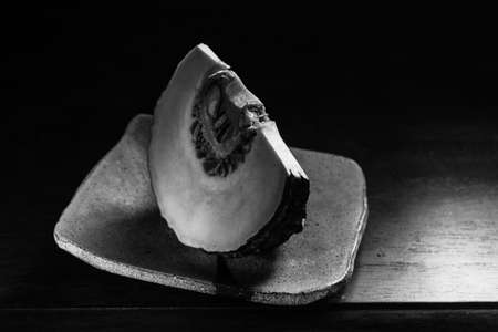 detail from pumpkin on ceramic plate.