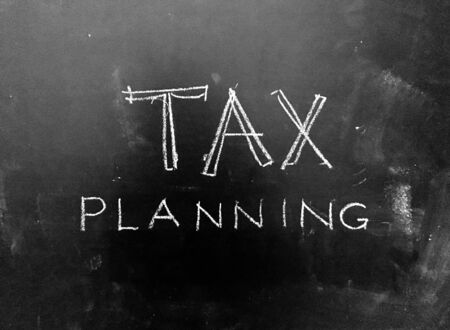 Tax Planning Handwritten on Blackboard as  Fileの写真素材