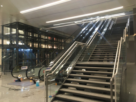 Staircase and Escalators at Departure Hall of New Terminal Extension at Rajiv Gandhi International Airport - Hyderabad,  India on 14th April 2024 - Stock Image as JPG Fileのeditorial素材
