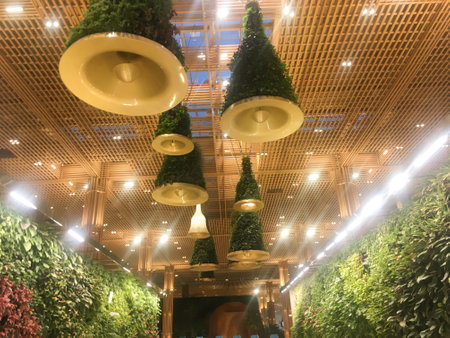 Hanging Green Bell Installation with Lights and Engineered Bamboo Paradise at Domestic Departure Hall of Terminal 2 (T2), Kempegowda International Airport, Bangalore, India - 18th June 2024 as JPG Fileのeditorial素材