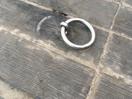 Steel rings on stone surface - Image as JPG Fileの写真素材